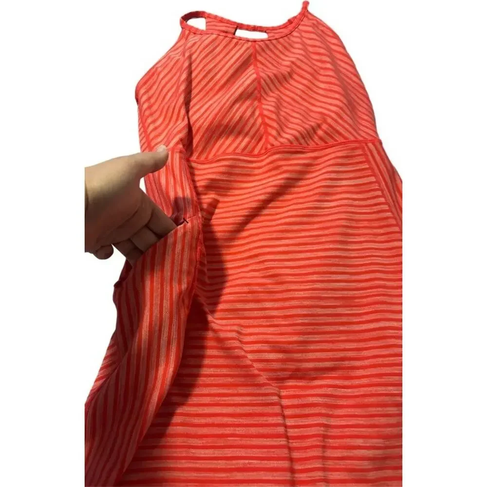 Title nine vibrant coral